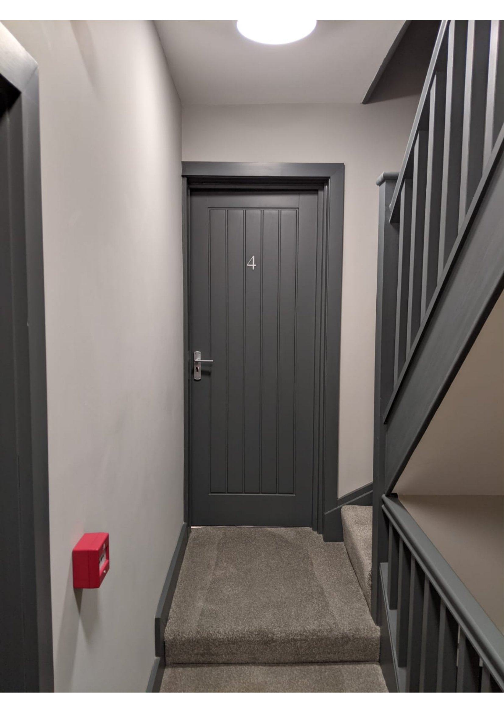 Communal stairwell fire door inspected by Fire Check Scotland